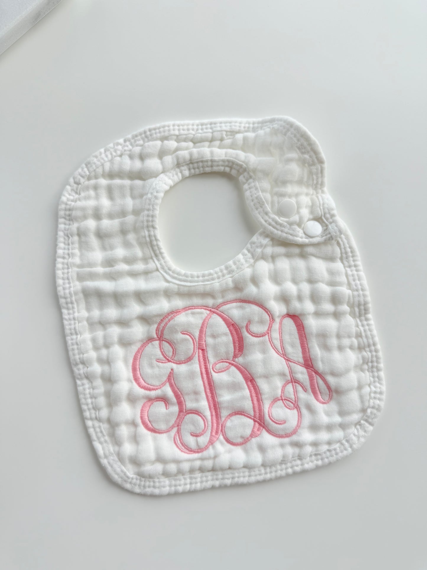 Monogram Muslin Baby Bib