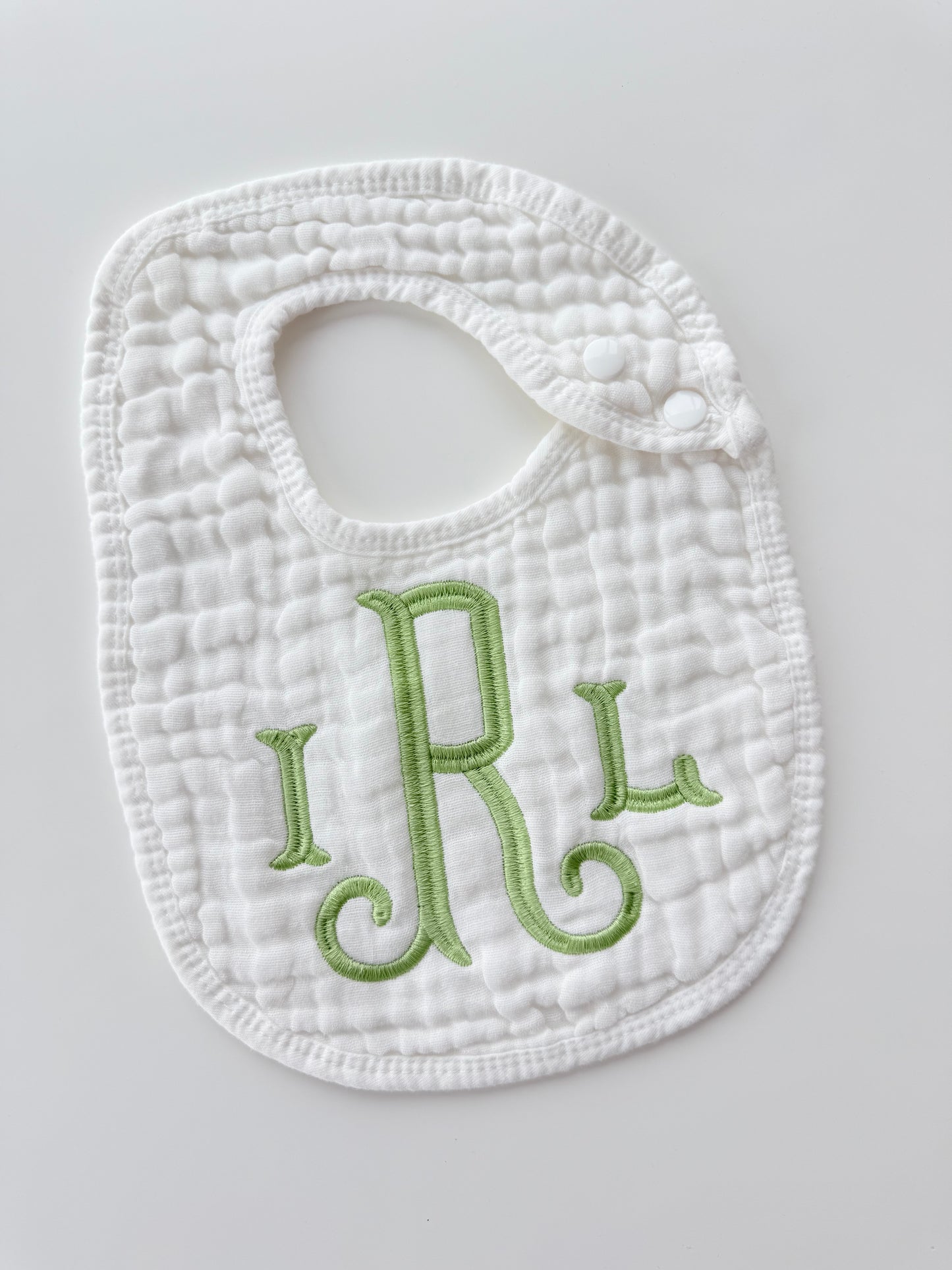 Monogram Muslin Baby Bib