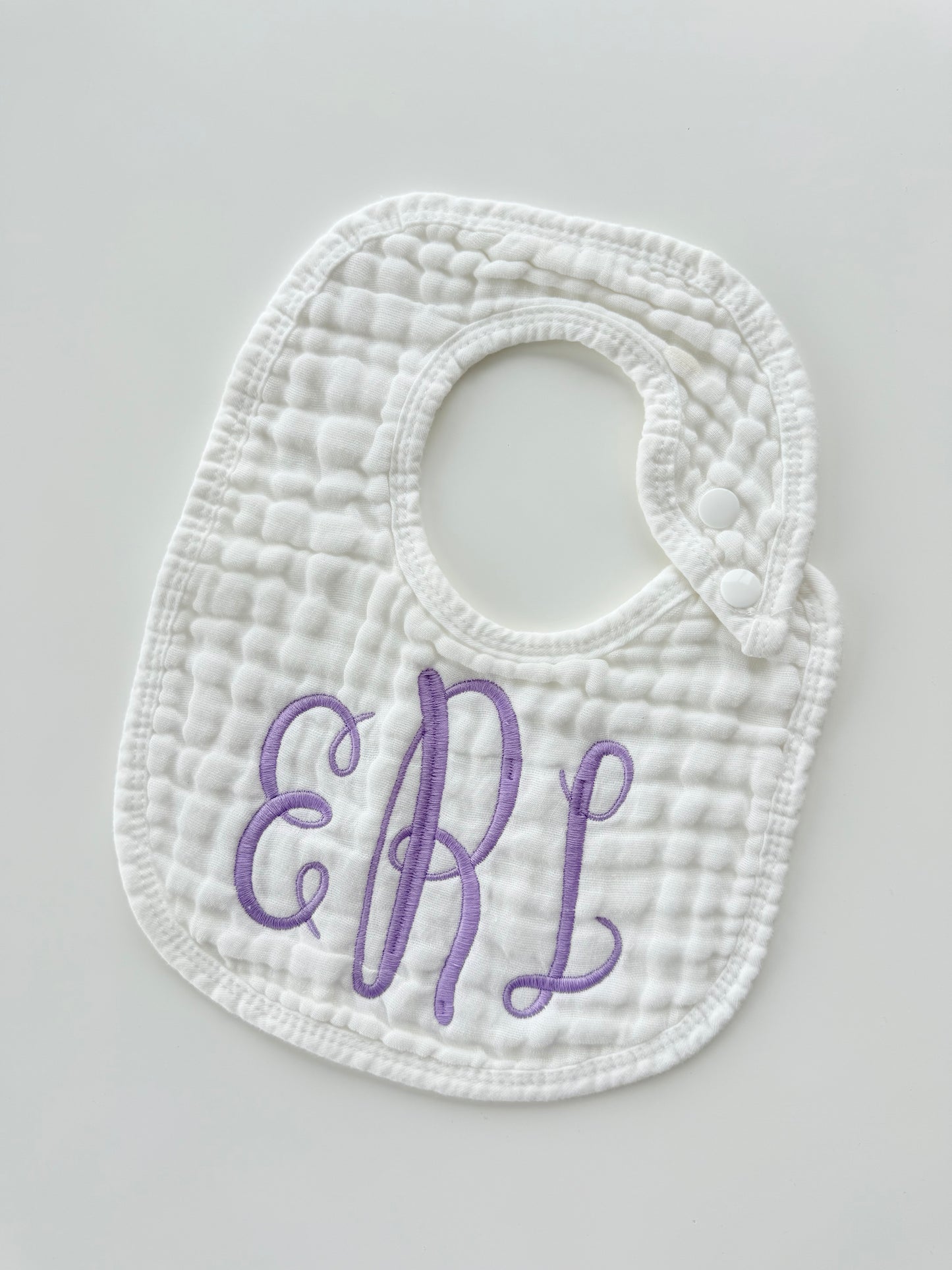 Monogram Muslin Baby Bib